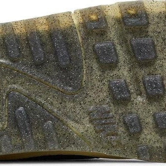Close-up of a worn shoe sole with visible tread pattern