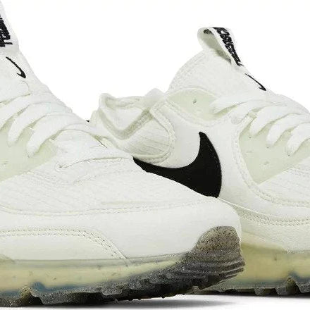 White sneakers with black swoosh logo on a white background