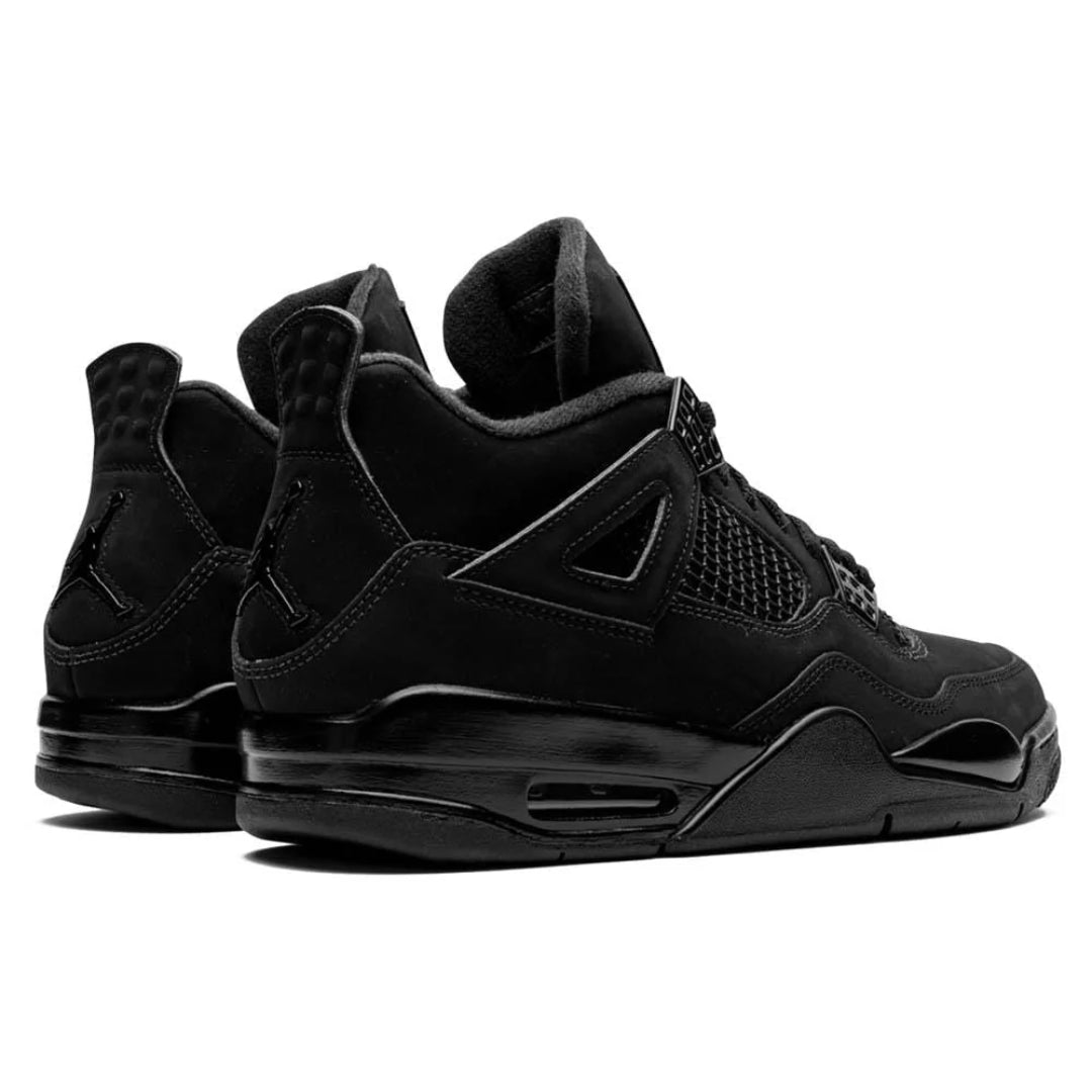Black sneakers with a white background