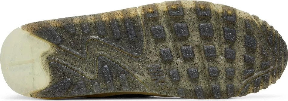 Close-up of a worn shoe sole with visible tread pattern