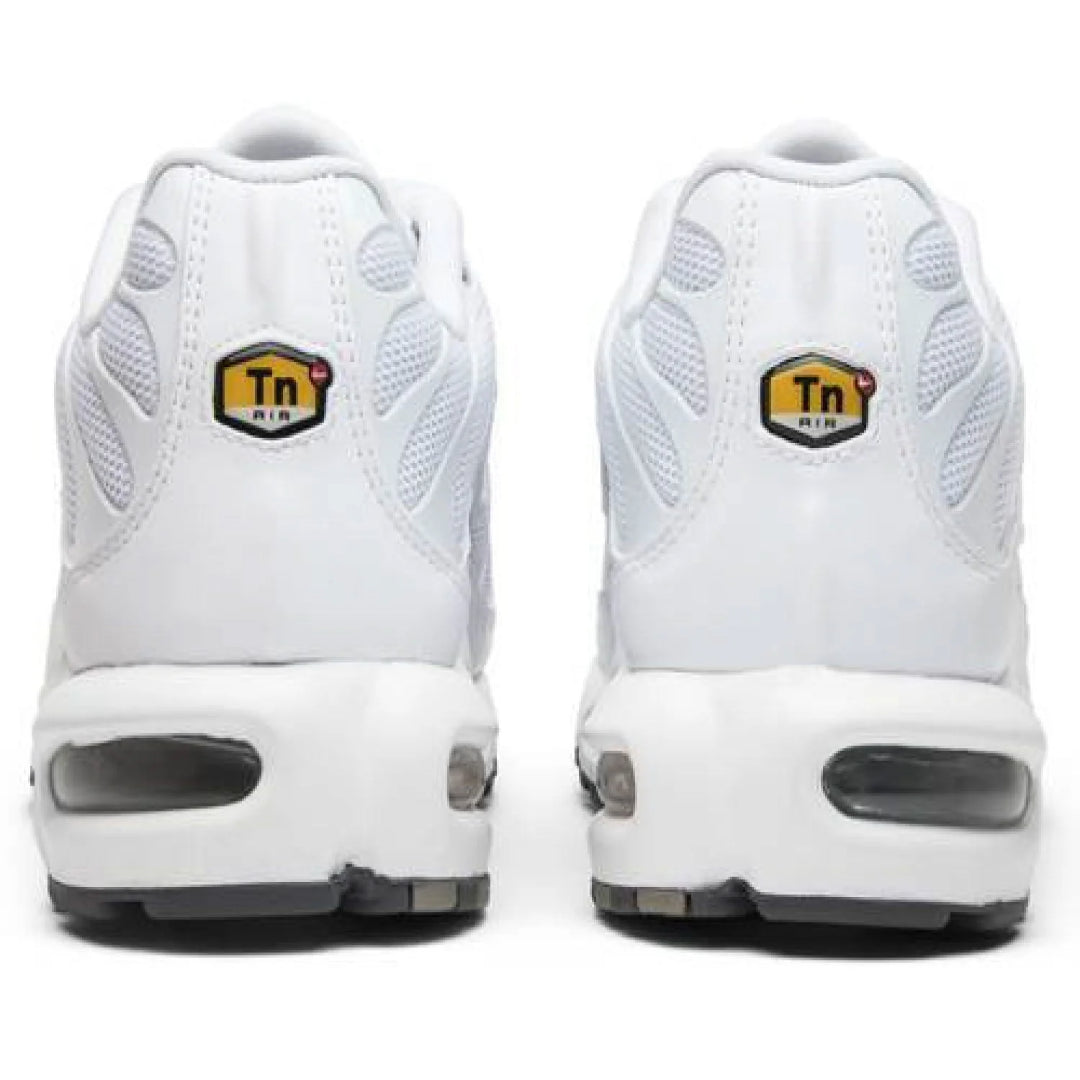 White sneakers with a logo on the back on a white background