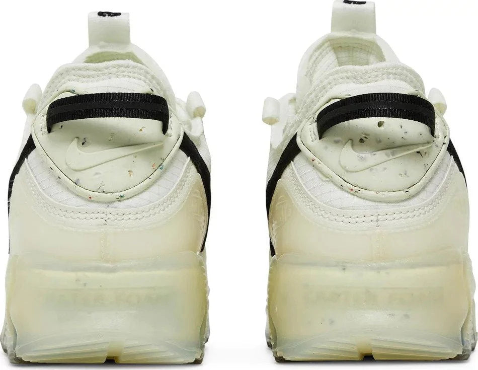 White sneakers with black accents on a white background